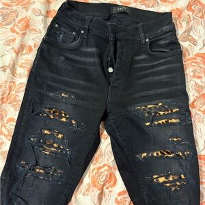 AMIRI Black Ripped Jeans with Animal Print